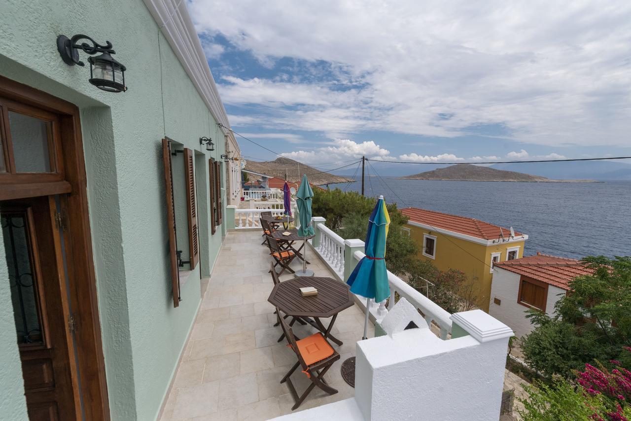 Roulas Apartments Chalki Town Exterior photo