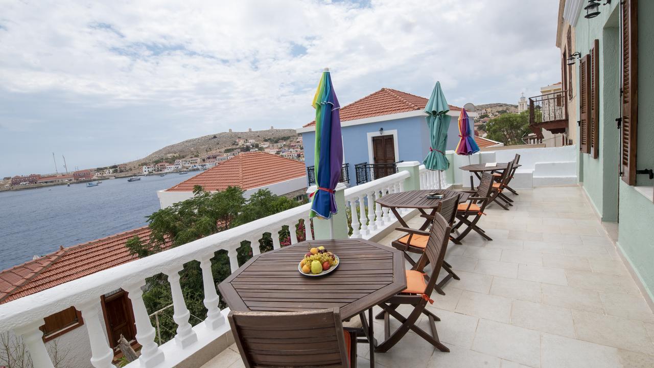Roulas Apartments Chalki Town Exterior photo
